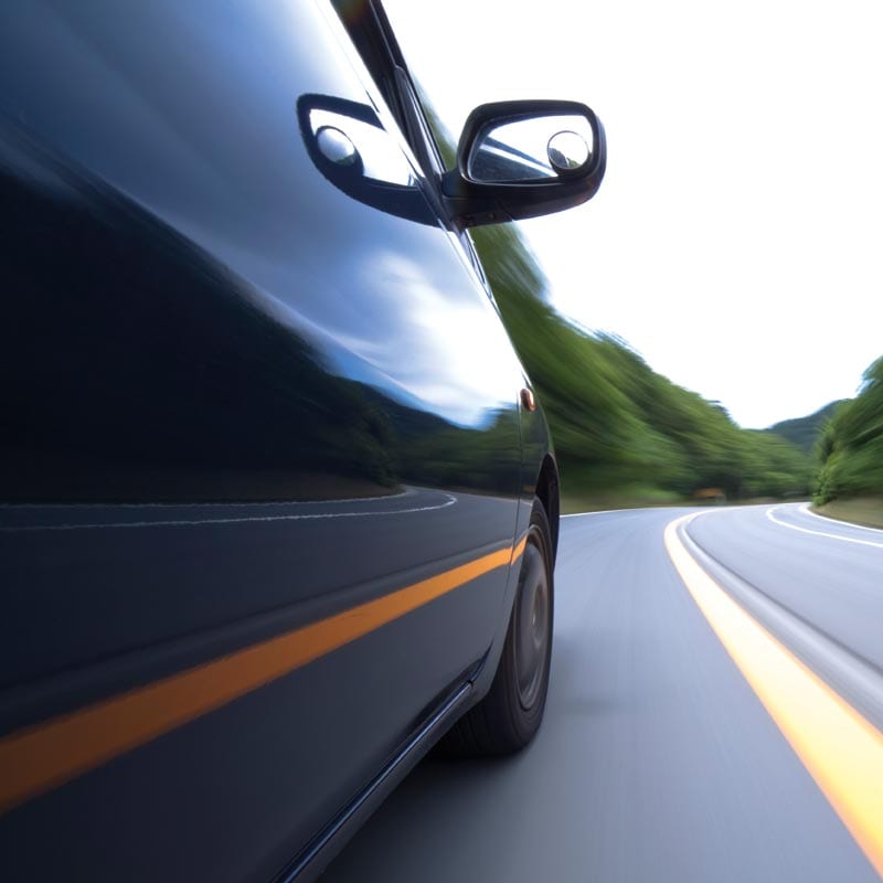 McLain-Insurance-Auto-Motorcycle-Insurance McLain Insurance Agency | Chesterfield, SC | auto and motorcycle insurance, car speeding down road